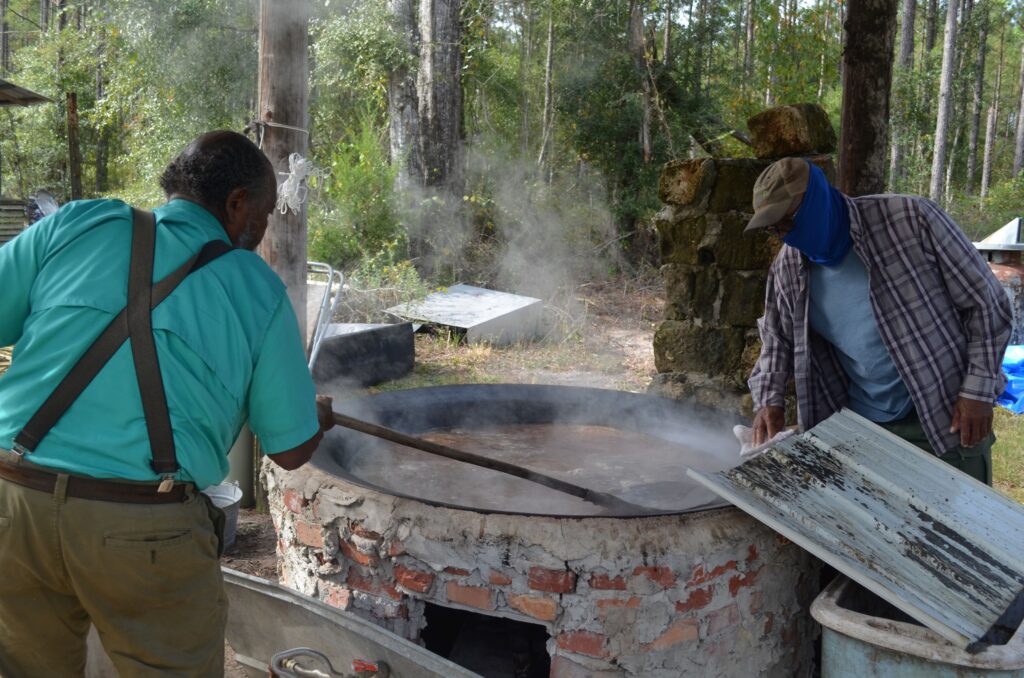 Johnny Bell likes to help make sugar cane syrup every Heritage Day.